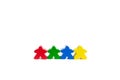 Work in a team concept. Four best friends. Colourful game figures are isolated on a white background