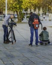 Work Team Filming a Scene at Street