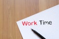 Work time text concept on notebook Royalty Free Stock Photo