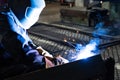 The work of the welder. Welding work in the factory floor Royalty Free Stock Photo