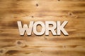 WORK word made with building blocks on wooden board Royalty Free Stock Photo