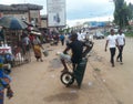 A young man waiting for work, somewhere around benin city