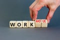 Work or workaholic symbol. Concept words Work or Workaholic on wooden cubes. Beautiful grey table grey background. Businessman