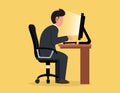 Workaholic businessman sitting working at a computer. concept workaholic