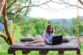 Workaholic woman working on a laptop outdoors. Royalty Free Stock Photo