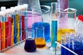 Work table of chemistry lab with glassware and measurement Royalty Free Stock Photo