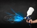 Worker with airbrush gun painting hand drawn car lines Royalty Free Stock Photo