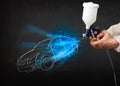 Worker with airbrush gun painting hand drawn car lines Royalty Free Stock Photo