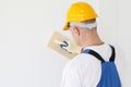 Worker aligns with sandpaper Royalty Free Stock Photo