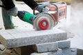 Worker with angle grinder