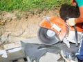 Worker with angle grinder