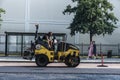 Worker asphalting a street in Malmo, Sweden