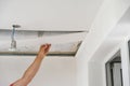 Worker assemble a suspended ceiling Royalty Free Stock Photo