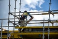 Worker assembling floor formwork on new social housing home unit block at 56-58 Beane St. Gosford, Australia. March 7, 2021. Part Royalty Free Stock Photo