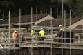 Worker assembling floor formwork on new social housing home unit block at 56-58 Beane St. Gosford, Australia. March 11, 2021. Part