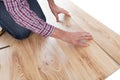 Worker assembling laminate floor Royalty Free Stock Photo