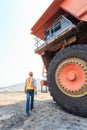 Worker Big Truck in Pit Royalty Free Stock Photo