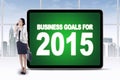 Worker with billboard of business goals for 2015 Royalty Free Stock Photo