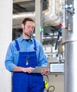 Worker with tablet computer  in industrial plant Royalty Free Stock Photo