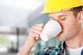 Worker on a break drinking coffee Royalty Free Stock Photo