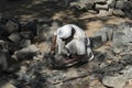 Worker breaking stones. Mumbai, India