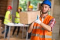 Worker bring construction beam Royalty Free Stock Photo