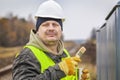 Worker with brush and paint near Royalty Free Stock Photo