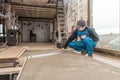 Worker builder checking the level of the concrete floor Royalty Free Stock Photo