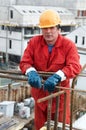 Worker builder at construction site Royalty Free Stock Photo