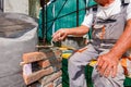 Worker is building wall of brick of building under construction Royalty Free Stock Photo