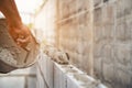 Worker building wall bricks with cement local Thailand Royalty Free Stock Photo