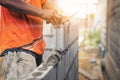 Worker building wall bricks with cement local Thailand Royalty Free Stock Photo