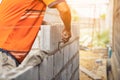 Worker building wall bricks with cement local Thailand Royalty Free Stock Photo