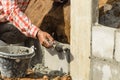 Worker building wall on sunny day Royalty Free Stock Photo