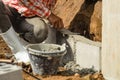 Worker building wall on sunny day Royalty Free Stock Photo