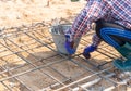 Worker bundle wire steel bar ground floor building Royalty Free Stock Photo