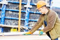 Worker carpenter preparing construction formwork for concreting Royalty Free Stock Photo