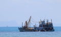 Worker carrying goods from capsizing Boat Royalty Free Stock Photo