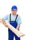 Worker carrying wooden plancks Royalty Free Stock Photo