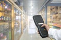 Worker checking and scanning package by tablet handheld in warehouse, Selective focus Royalty Free Stock Photo