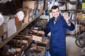 worker checking small details for sanitary engineering in workshop Royalty Free Stock Photo