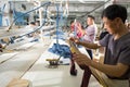 Worker in a chinese garment factory Royalty Free Stock Photo