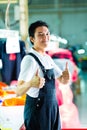 Worker in a chinese garment factory Royalty Free Stock Photo