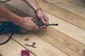 Worker clamps a drill into a drill