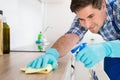 Worker Cleaning Countertop With Rag Royalty Free Stock Photo