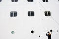 Worker Cleaning a cruise ship