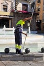 Worker cleaning an ornamental fountain in Ciudad Real, Spain Royalty Free Stock Photo