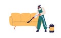 Worker cleaning sofa with vacuum cleaner. Furniture upholstery cleanup. Woman from professional housework service Royalty Free Stock Photo