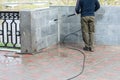 Worker cleaning street