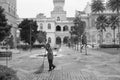 Worker cleaning at the Sultan Abdul Samad Building, Kuala Lumpur, Malaysia. Royalty Free Stock Photo